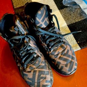 A pair of FENDI "Forever" sneakers as shown a little wear on the inside tag.